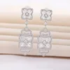 Dangle Earrings Evacandis Floral Design Inlaid Cubic Zirconia drop for Women Stylish White Golden Gemstoneプレミアムファインジュエリー