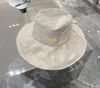 夏のフリル麦わら帽子の贅沢なトップハットファッションバケツバケツサンプロテクションレディートラベルビーチボウノットサンハットデザイナー大型イーブキャップ