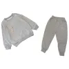 Vêtements Ensembles à sweat à capuche bébé manteau de créateur en bassin en bassin en tout-bas de deux pièces vêtements pour enfants zipper filles garçons à manches longues pantalons tops marque enfants dham3