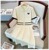 Women's casual dress Summer fashion black and white ice silk knitted dress Designer brand women's slim dress button lapel A-line skirt large size skirt