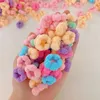 Akcesoria do włosów 100pcs/pudełko mini słodkie dziecko do włosów kolorowe dla dzieci krawat hair scrunchies elastyczne gumki dla dzieci akcesoria do włosów