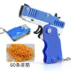 1PCS Alloy Keychain Rubber Band Gun - Shooting Pistol Toy for Kids' Outdoor Fun - Unique Metal Gift for Boyfriend