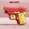 Gun Toys 3D Printed Model Gravity Straight Jump Mini Toy Carrot Gun Non-Firing Bullet Radish Toy Gun Kid Stress Relief Toy Christmas Gift T240513