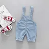 Overalls Childrens denim top adjustable unisex pendant childrens cotton elastic jeans top fashionable simple and loose fitting d240515