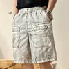 Heren jeans 2024 retro vuile noodlijdende werkkleding shorts zomer los rechte afval bodemstijl casual vijfde broek