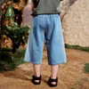 Shorts Amila2024 Sommer Neue Jungen und Mädchen Bottom hochwertige Mode weiche Fünf -Punkte -Denim Shorts Childrens Clothingl2405