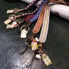 Mobiltelefonbänder Anti-verlorene Vintage Plaid Fabric Lanyard Hängende Nackenkabel für Mobiltelefon Fall-ID-Kartenzubehör-Gurte