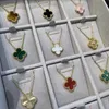 2024 Klassieke vier blad klaver kettingen Hangers Moeder van pearl roestvrij staal vergulde 18k voor meisjes Valentijns Moederdag verloving Sieraden-gift Groothandel V8