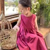 女の子2024夏の子供向け韓国の新しいトレンドノースリーブの大きなポケットコットンタンクトップドレス