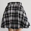Saias mulheres saia curta moda moda Tartan plissout gleastwear lateral botão lateral feminino mini casual