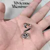 Designer Westwoods Planeta de abertura de ondas geométricas Saturn Pingente anel feminino no estilo instagram design de crowds indicador de dedo unha