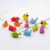 Charmes 10 / 12pcs miniatures mini-dinosaure résine colorée kawaii dessin animal pendentif bricolage artisanat pour les bijoux de boucle d'oreille