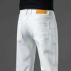 Pantalones para hombres 2024 Nuevo para hombres Cotton White Cotton Slim Slim Smart Jeans informal Moda de negocios Beige Beige Denim pantalones Y240514