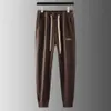 Loewew Pants Designer High-End Mens Sweatpants Designer Pants Autumn Lace-Up Fotskydd Loewew Slacks Män Kvinnor Par Randiga Jacquard-byxor 922