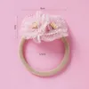 Accessori per capelli 1pcs adorabile principessa baby -fascia accessori kaii kaii rosa fiore chiffon nylon allungamento fascia floreale per bambini