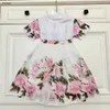 Top Princess Dress Press Baby Trade Closuits Size 90-150 см. Детская дизайнерская одежда для цветочной печати девочки футболка и короткая юбка 24mar