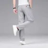 Pantalon masculin de style classique pour hommes pantalon décontracté élastique pas de fer anti-rideaux de couleur solide pantalon droit des vêtements de marque y240514