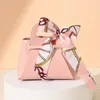 ギフトラップ1PCレザーバッグボウリボンパッケージバッグウェディング好意分布Eid Mubarak Candy Box Mini Handbag