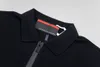 2024 Classic Street Polo Mens Leisure Brand T Shirts Stitching Embroidery عالية الجودة أزرار الليزر المخصصة الكلاسيكية تصميم العلامة التجارية Black and Red Glue Design
