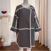2024 Spring middele lengte gebreide shirt kleurblok Cardigan dames trui gepersonaliseerde high -end losse jas