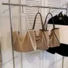 ヴィンテージショルダーバッグデザイナーファッションストリップサマービーチバッググラス織り旅行バッグ大容量トート女性のショッピングバッグ24040213