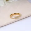 Роскошное кольцо с двойной буквами дизайнер кольцо кольцо женщины 18 тыс. Золотая из нержавеющей стали любовь свадебные украшения для свадебных украшений Кольцо Кольцевое кольцо для резьбы. Размер 6 7 8 9