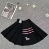 TB Femme Jiets Robes décontractées Shorts de créateurs Jupe plissée haute taille mince jupe courte de jupe de printemps