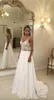 2023 Cheap Beach Wedding Dresses Lace Appliqued V Neck A Line Sexy Backless Boho Wedding Dress Sweep Train Custom Garden Bridal Gowns