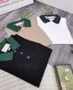męska koszula polo designer koszule dla mężczyzny moda focus haft haft wąż podwiązka małe pszczoły wzór ubrania tee czarno -białe męskie koszulka
