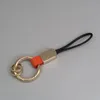 Llaves de cuero genuinos listones simples hombres para mujeres soporte para automóviles llave de llave de llave accesorios de llaves de tervos regalos por teléfono correas