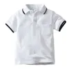Nieuwe zomerbabyjongens turn-down kraag polo katoen shirts kinderen sport tee witte kleur l2405