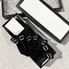 مصممة جوارب سوداء أسود أبيض أخضر خطاب اللون 5 أزواج مربع كلاسيكي هوك الكاحل التنفس كرة القدم كرة السلة الجوارب الرياضية مع صندوق