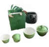 Designer green travel tea set Zongzi shape classic logo carving portable ceramic tea set lazy person one pot three cups outdoor camping tea cup with storage box
