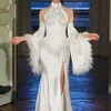 2023 Nieuwe etiquette van de schouderflare mouwen middelste mannelijke veer lange jurk dames