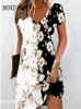 Grundläggande avslappnade klänningar vintage kvinnor midi klänningar för 2024 Etnisk stil blommig tryck lös klänning plus storlek casual kort slve pullover v-hals klänning y240515