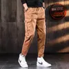 Pantaloni maschili maschi arancione pantaloni da carico tattici di cotone casual elastico pantaloni cohinding y240513