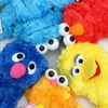Gevulde pluche dieren originele sesam kralen handpopprestaties Elmo cartoon zachte poppen verjaardag en nieuwjaarscadeau voor kinderen Q240515