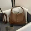 10a tasarımcı omuz çantaları erkek denim deri çanta koltuklu debriyaj çantaları lüks çanta en çok satan kadın koltuklu crossbody tote hilal çantası sıcak toptan