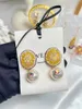 dangle earrings evacandis golden crystal for elegant vintage gemstone Jeweller
