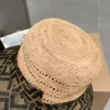 Ontwerpers hoed, modieus gebreide stro geweven omgekeerde brief visser hoed ademende zon schaduw strand hoed vissen hoed luxueus en modieus