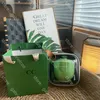 Designer Green Travel Tea Set Zongzi Shape Classic Logo Carving Portable Ceramic Tea Set Lazy Person One Pot Three Cups Outdoor Camping Tea Cup With Storage Box