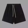 Pu Pujia High Version 24SS Nouveau triangle de patch Triangle Summer Wool Set Shorts pour hommes et femmes