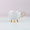 Tazze di tazze da caffè e tazze da caffè espresso in ceramica con cucchiaio a piastra set di acqua di alta tè in marmo a casa latte per colazione