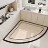 Mattor American Light Luxury Heart Formed Diatom Mud Floor Mat Kök Vatten absorberande olja och smutsig resistent dörr Anti Slip Can H240517