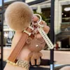 Keychains Lanyards Designer Key Chain Luxury Bag Charm Female Cute Bear Ring Fashion Fur Ball Pendant Trendy Accessories Number Plate Ot9Mv