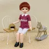 Aitoyya 16 bjd puppe 30 cm kurzen haarjungen 20 bewegliche gemeinsame Puppenspielzeug Fahion Kleidung und Schuhe DIY Spielzeuggeschenk für Mädchen 240516