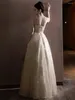 Повседневные платья для шампанского платье для женской одежды из бисера, рукавочная рукавов, длинная hailter a-line Юбка Элегантное вечернее платье M201