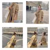 Designer des trenchs pour femmes 2022 manteau européen et américain de style plaid de luxe mode faux deux lâches en milieu de longueur de chute ap otidm