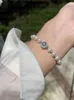 Bracelet de perle de perles naturel gris blanc bracelet de perle de mer de mer d'été avec boîte à eau douce bracelet de code de code de code de la perle de haute qualité de haute qualité style
