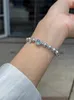 Bracelet de perle de perles naturel gris blanc bracelet de perle de mer de mer d'été avec boîte à eau douce bracelet de code de code de code de la perle de haute qualité de haute qualité style